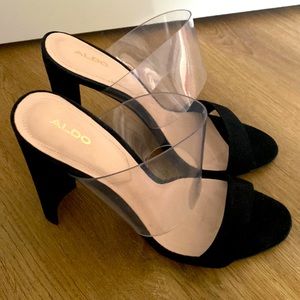 Black and clear strap mules